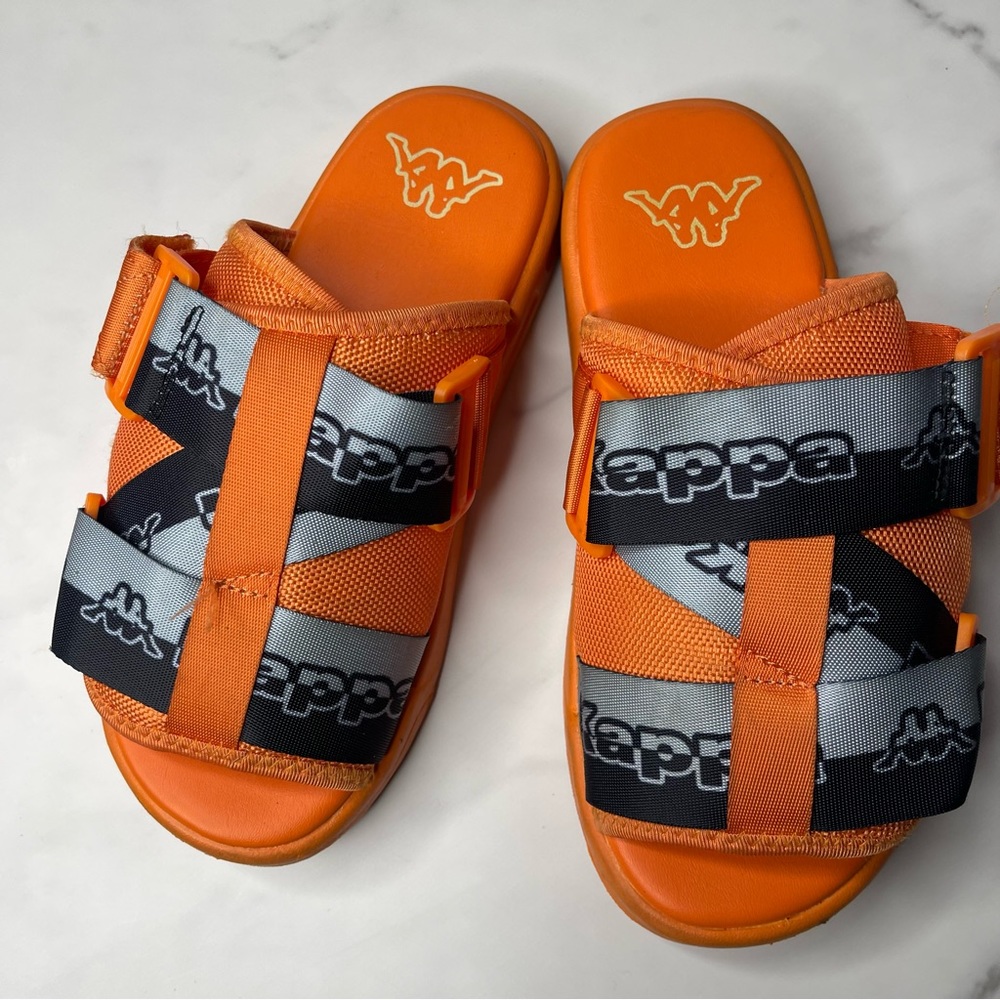 Kappa slides worn twice size 4y big kids.